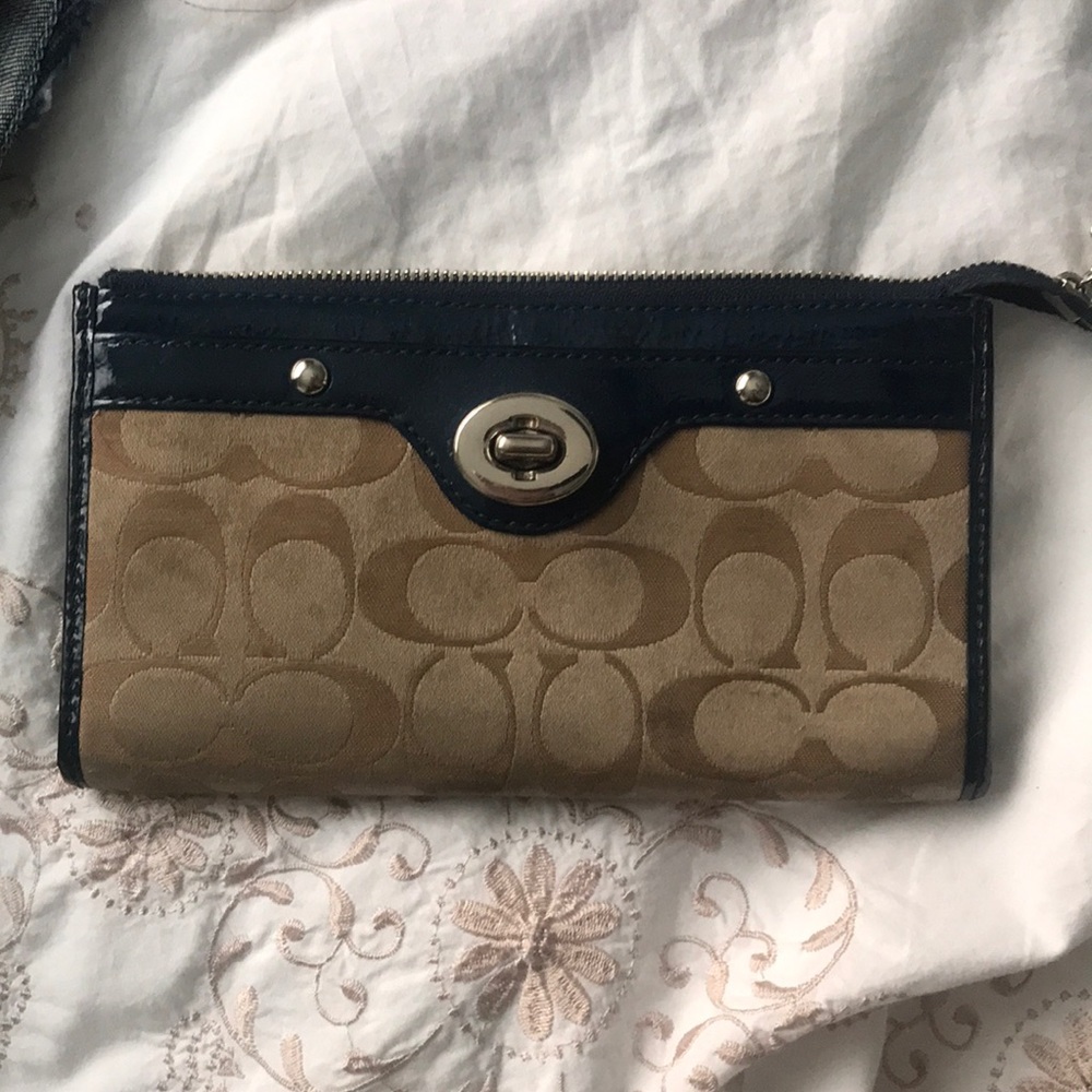 Tan and navy coach wallet